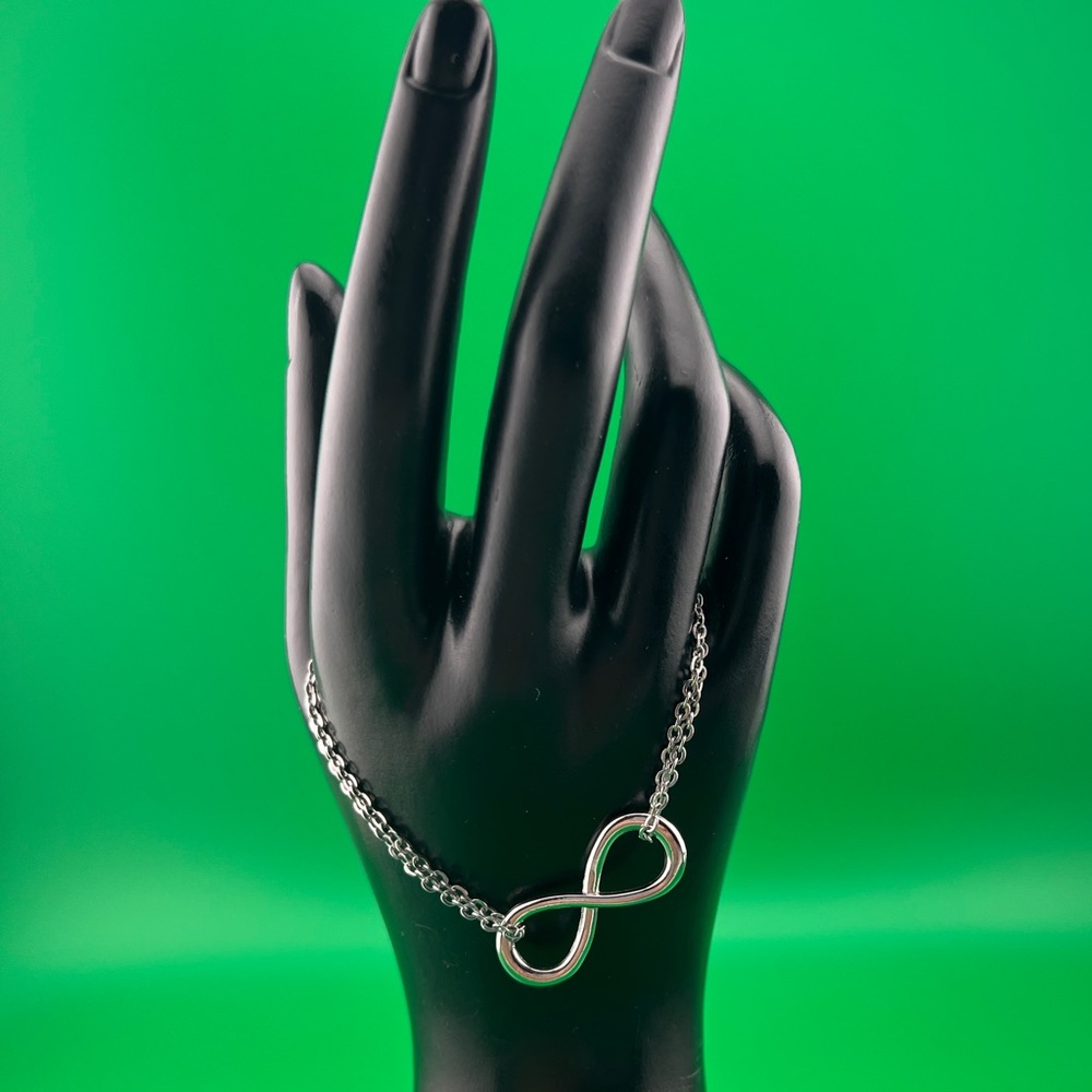 3/$20 silver tone infinity symbol bracelet